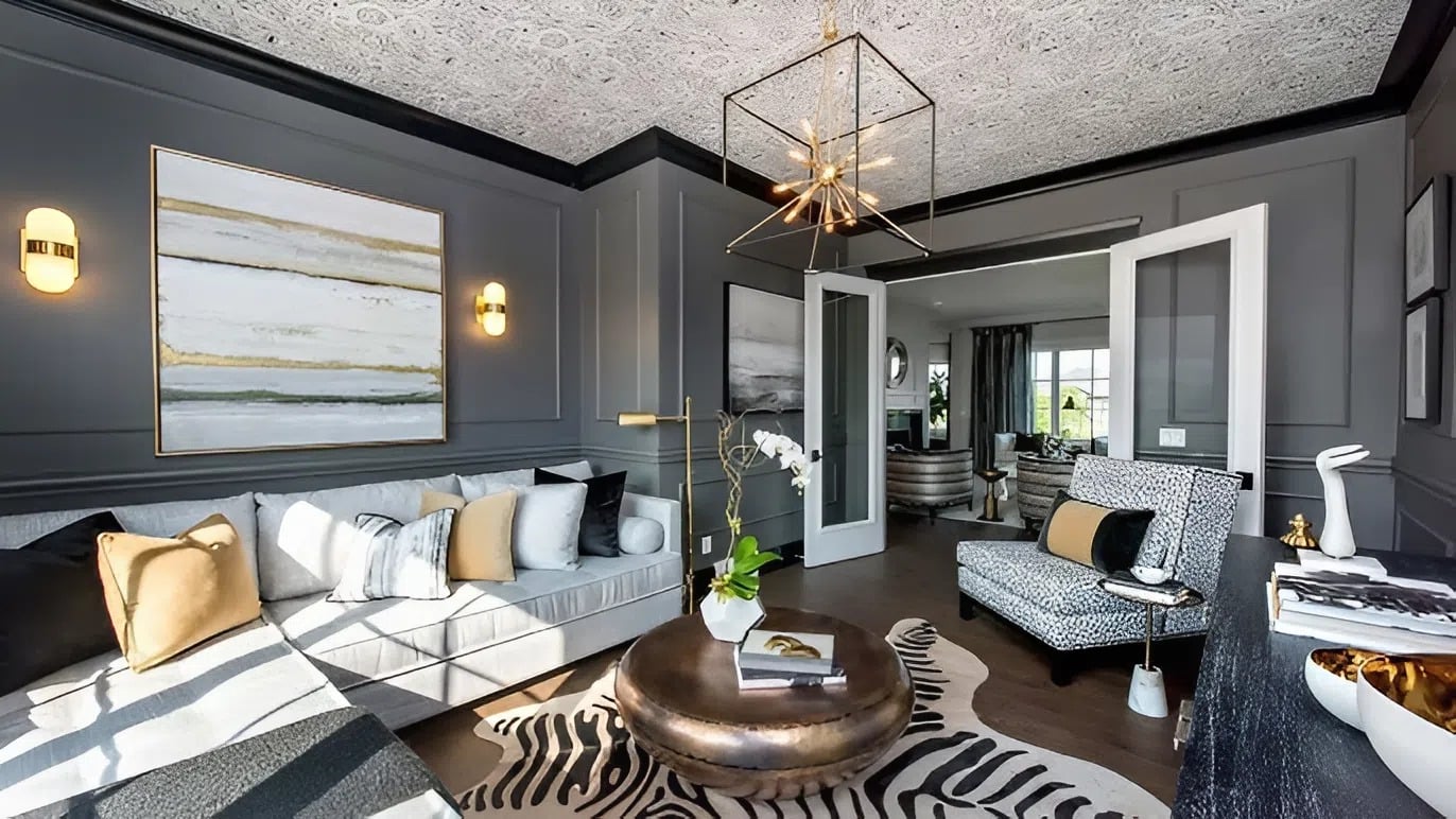 Living room with dark gray interior paint and crisp white trim by an interior painter in Phoenix, MD