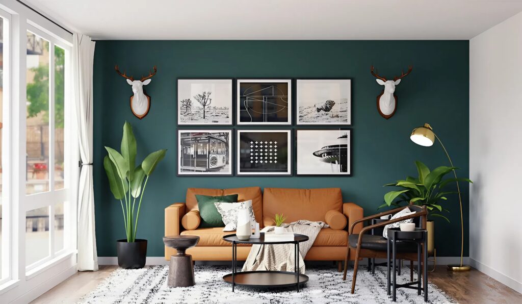 Living room with deep green accent wall and clean corner detailing by an interior painter in Phoenix, MD