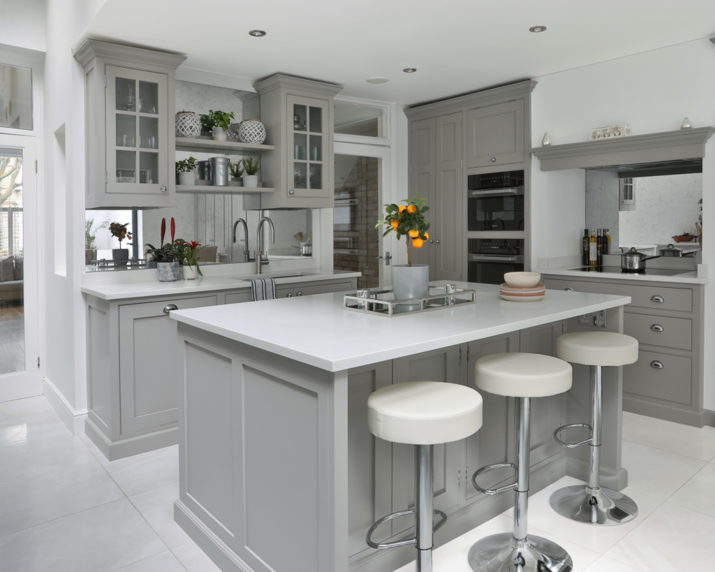Modern kitchen with soft gray painted cabinets and a seamless finish by an interior painter in Phoenix, MD